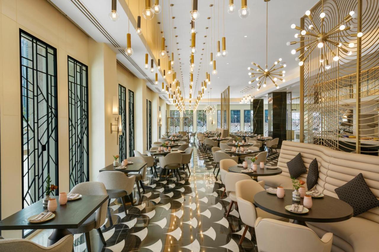 Wyndham Grand Doha West Bay Beach Екстериор снимка The restaurant